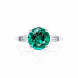 Lovetta white gold trilogy stone set Chatham round emerald diamond engagement ring Lily Arkwright