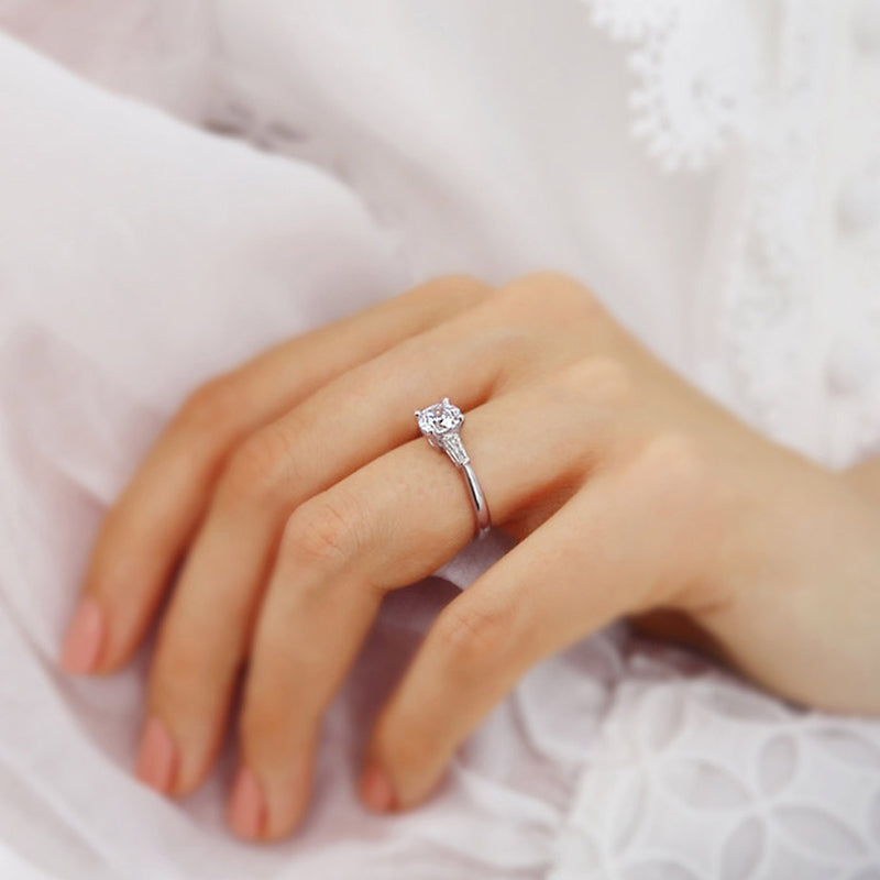 LOVETTA - Round Moissanite & Diamond Baguette 18k White Gold Trilogy Engagement Ring Lily Arkwright